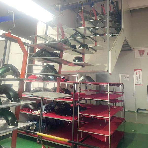 Motorcycle accessories paint assembly line